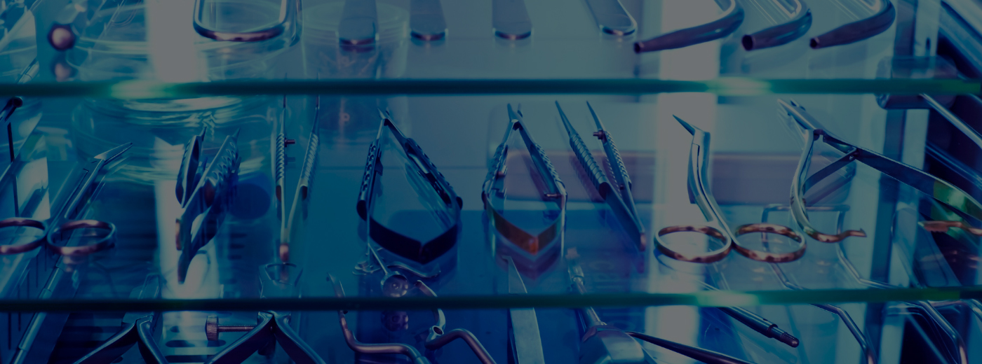 A glass cabinet filled with surgical tools, demonstrating a range of instruments used in medical procedures