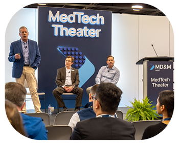 Medtech theater at a conference, featuring speakers and an audience engaged in discussions about medical technology advancements