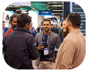 A diverse group of people gathered together, engaged in conversation at booth crawls