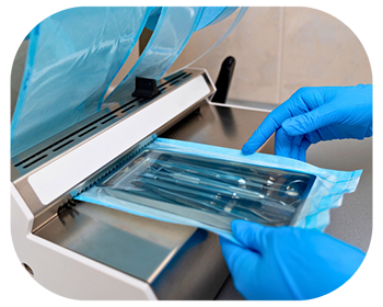  A person wearing blue gloves holds a clear plastic bag, possibly for collecting or storing items