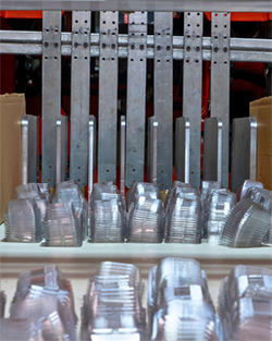  A large stack of plastics containers